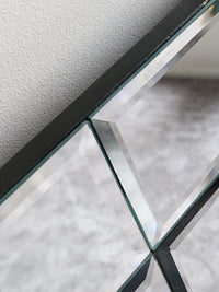 Contemporary frameless centre glass mirror