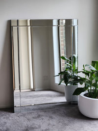 Contemporary frameless centre glass mirror