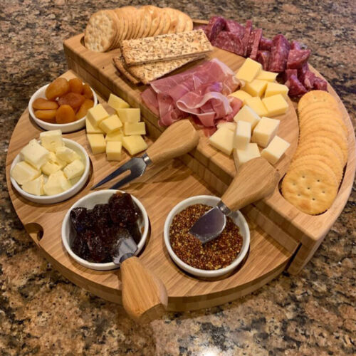 Round wooden chopping board and cutlery set